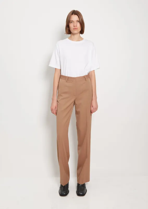 Pulley Wool Pants sold by La Garconne