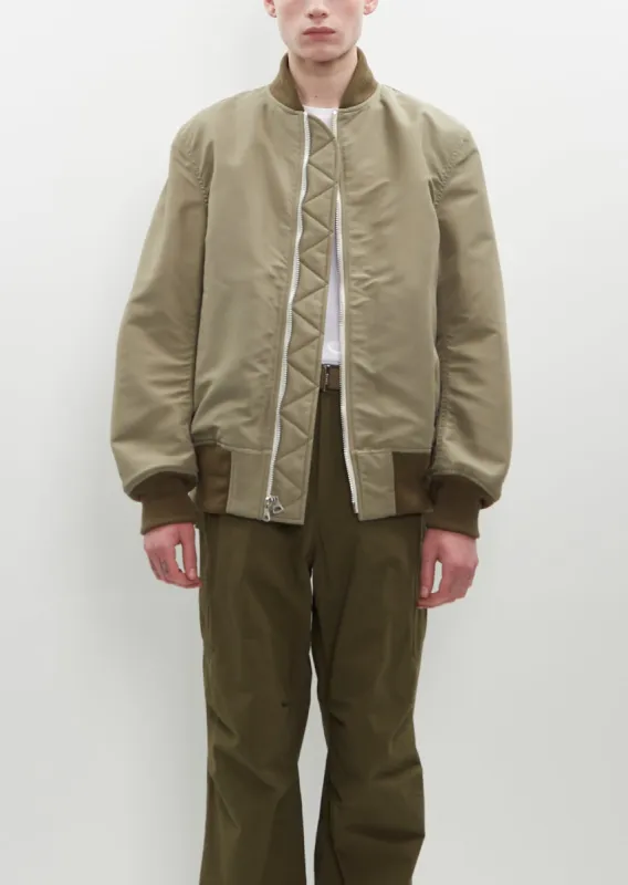 Nylon Reversible Twill Blouson sold by La Garconne