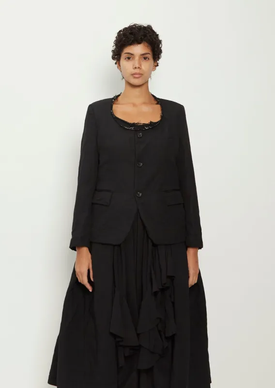 Wool Collarless Jacket sold by La Garconne
