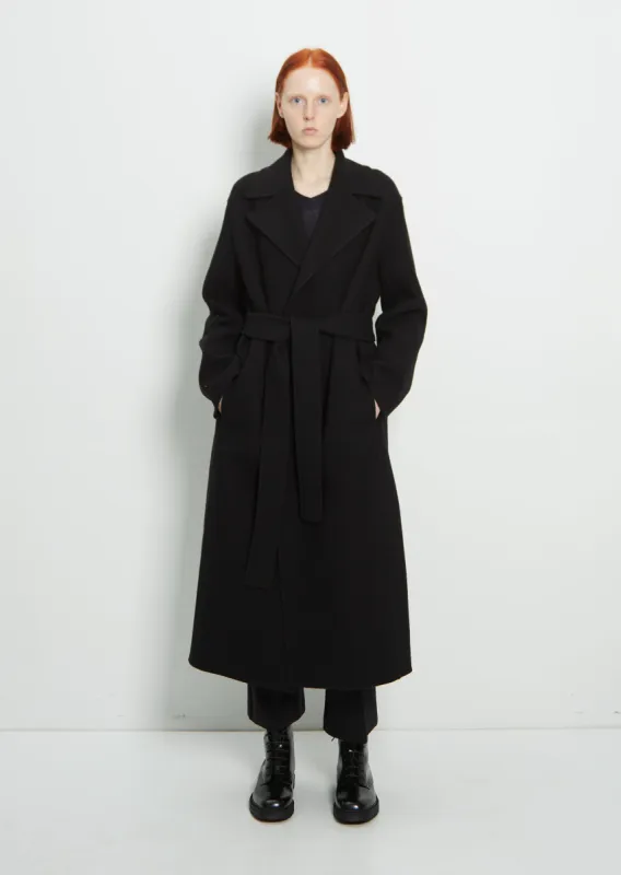 Malika Coat sold by La Garconne