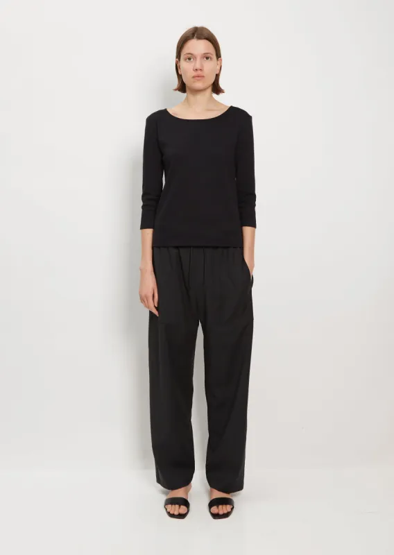 Light Wool Drawstring Trousers — Black sold by La Garconne