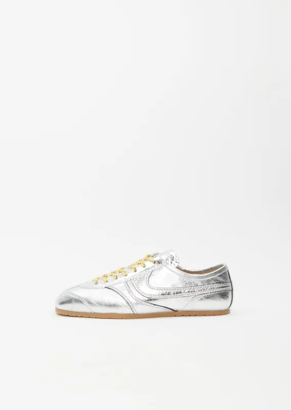 Leather Trainer — Silver sold by La Garconne