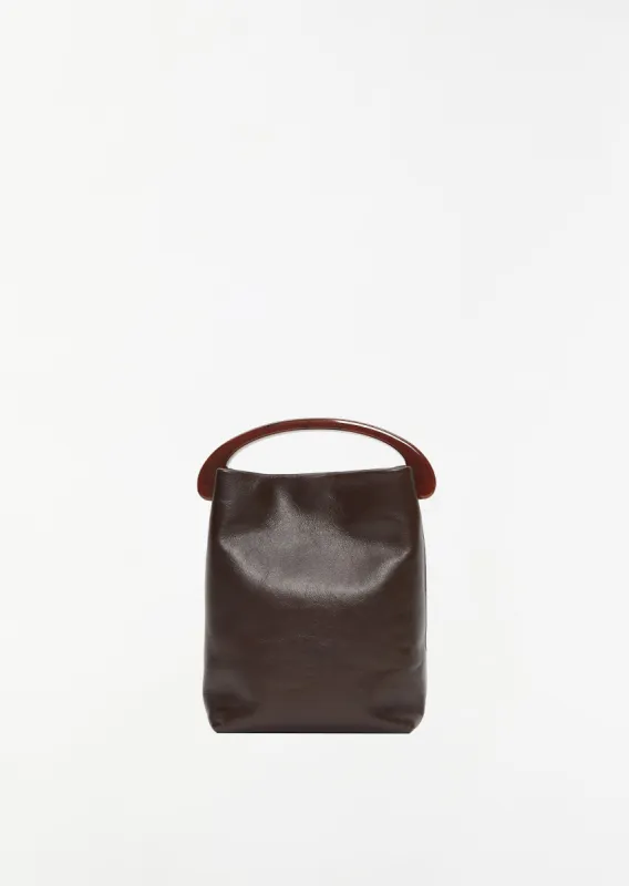 Tumbled Calf Leather Bag — Wine sold by La Garconne