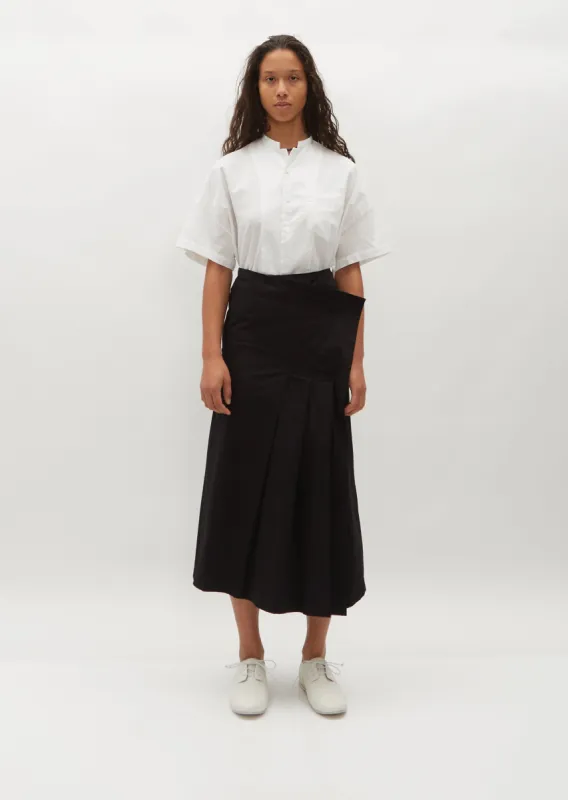 Pleated Wrap Skirt — Black sold by La Garconne