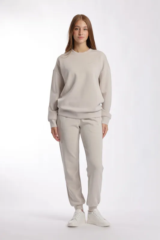 Premium luxe sueded scuba crewneck and jogger set in bone sold by Lazypants