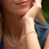 Silver Eternity Twist Charm Bracelet sold by Lily Charmed