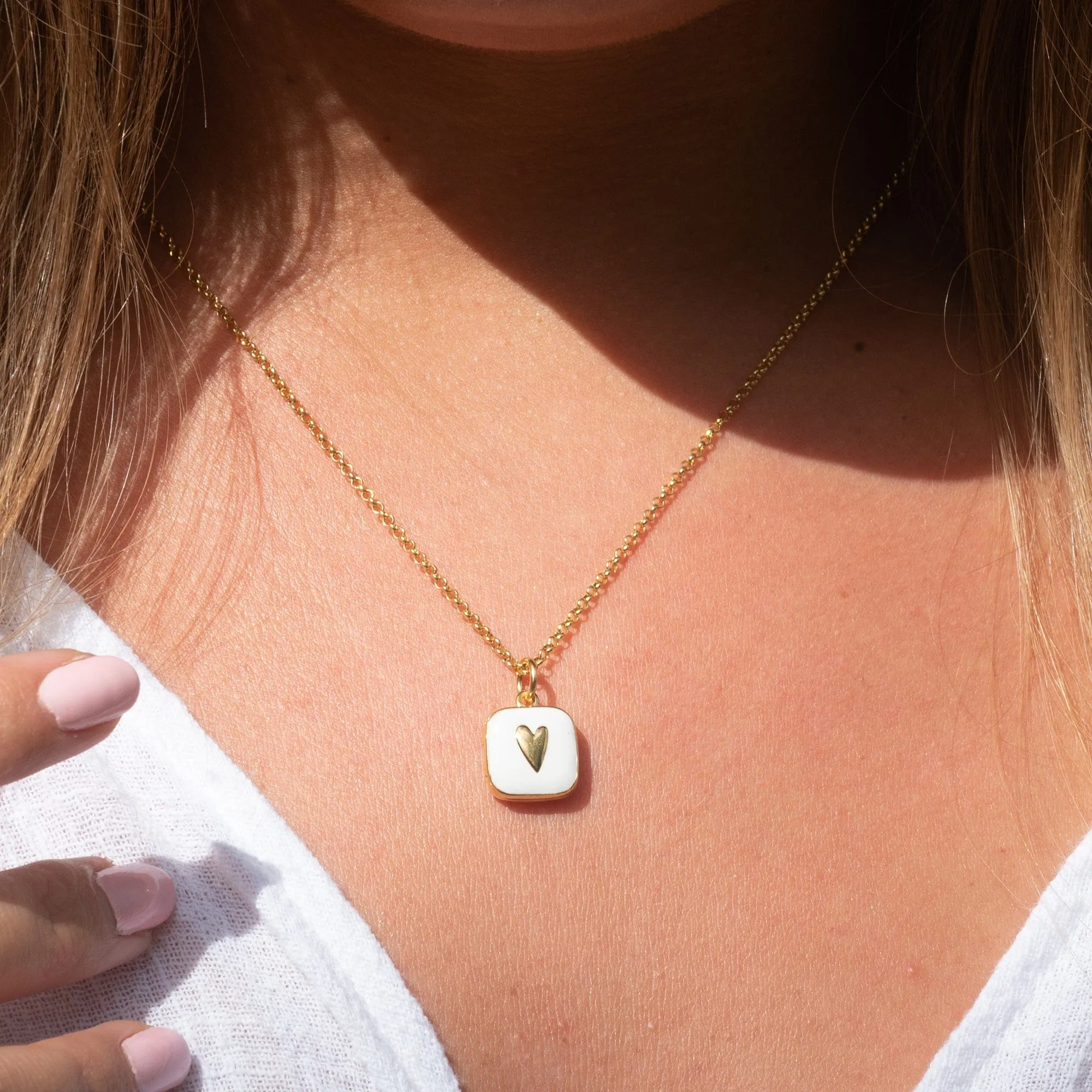 Gold Plated White Heart Locket Necklace sold by Lily Charmed product image thumbnail 3
