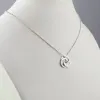 Sterling Silver Engraved Interlocking Circles with Center BS Necklace sold by Limoges Jewelry