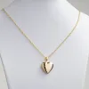 Goldtone Engraved Heart Locket Necklace sold by Limoges Jewelry