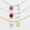 Initial and Birthstone Pearl Charm Necklace sold by Limoges Jewelry