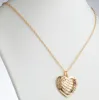 14K Gold over Sterling Family Heart Birthstone LOVE Pendant sold by Limoges Jewelry