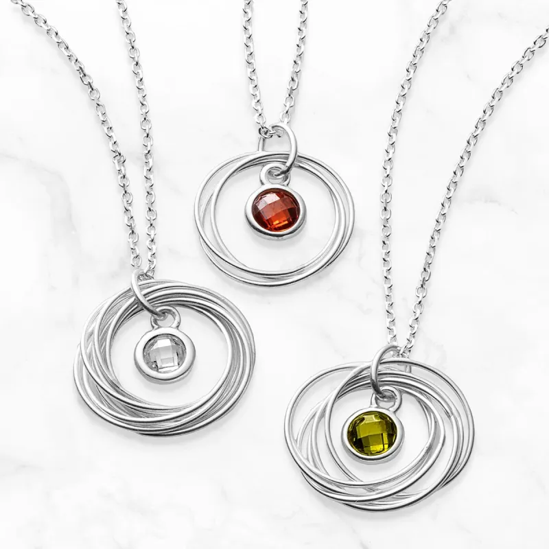 Sterling Silver Milestone Interlocking Rings with Birthstone Necklace sold by Limoges Jewelry