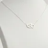 Sterling Silver Engraved Interlocking Heart Necklace sold by Limoges Jewelry