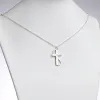 Sterling Silver Personalized Cross with Swirl Necklace sold by Limoges Jewelry