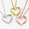 Engraved Family Name Twisted Heart Necklace sold by Limoges Jewelry