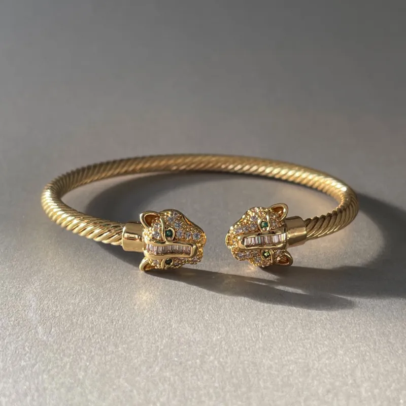 Zuri Gold Textured Panther Cuff sold by Luxe Tones