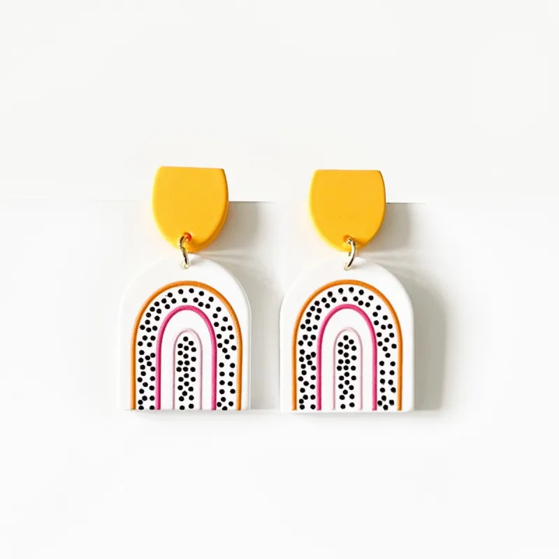 Ruby Rainbow Arch Earrings sold by Luxe Tones