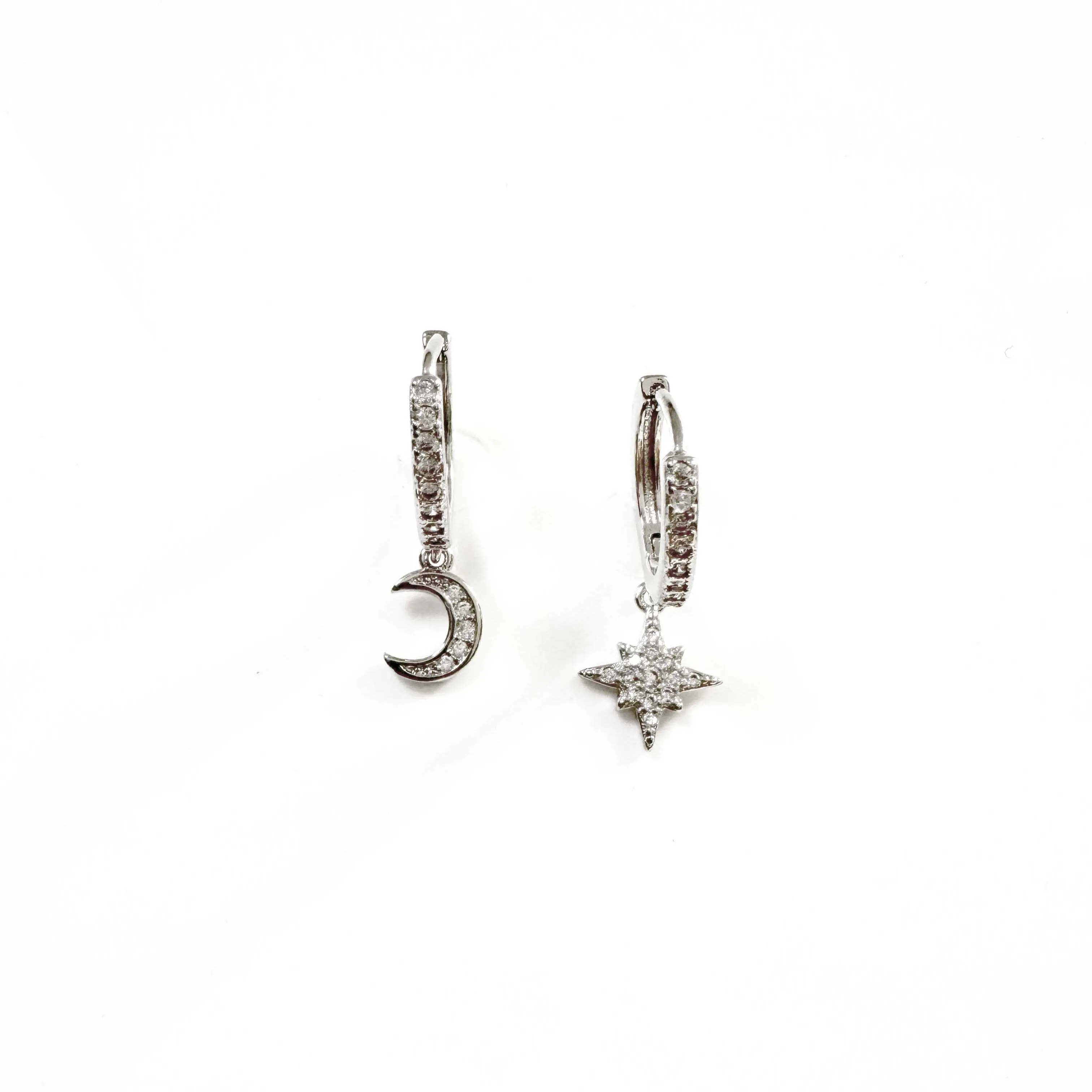 Seren Silver Moon and Star Huggie Hoop Earrings sold by Luxe Tones