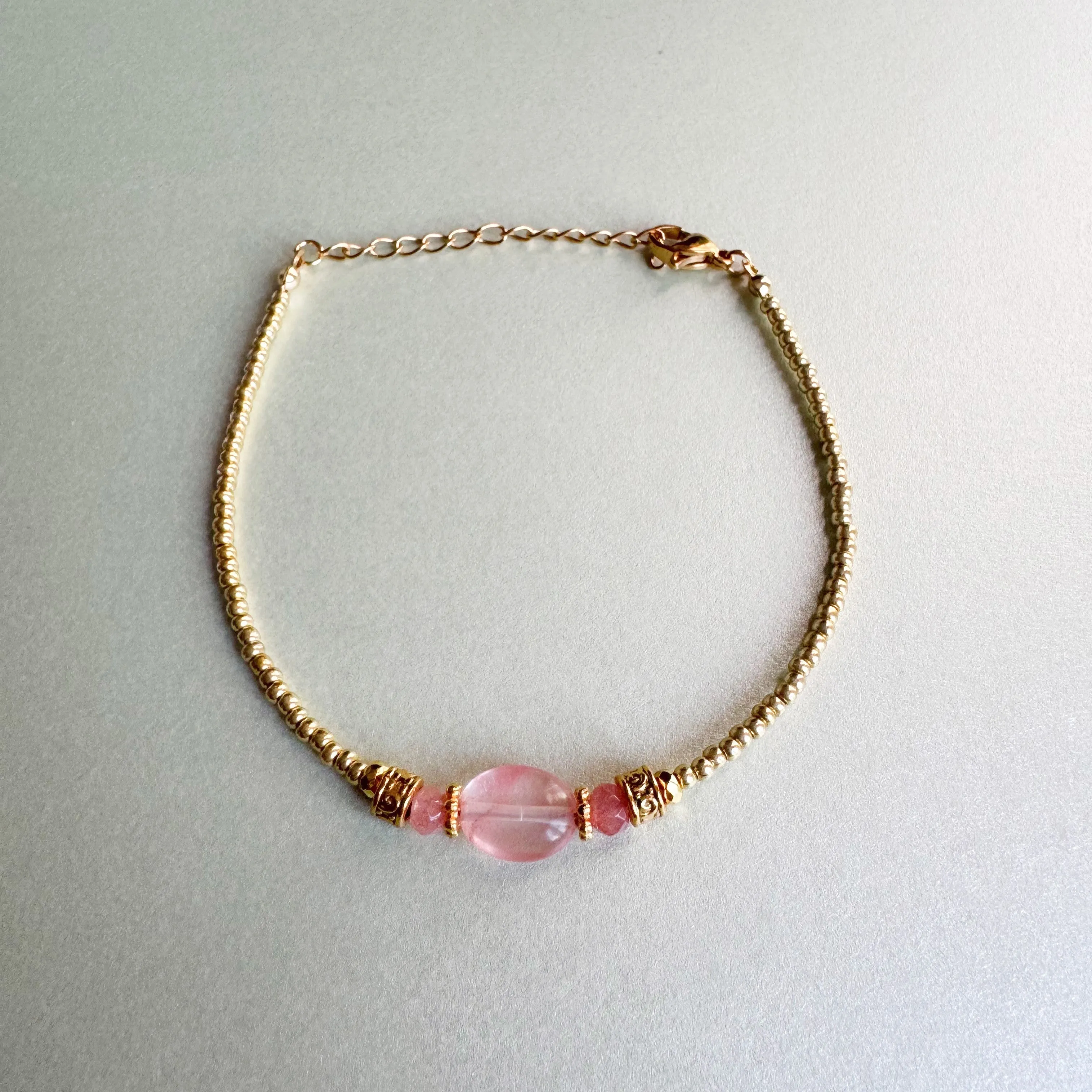 Calmara Gold Beaded Bracelet with Natural Blush Stone sold by Luxe Tones