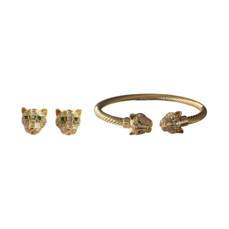 The Zuri Panther Earrings and Cuff Set sold by Luxe Tones