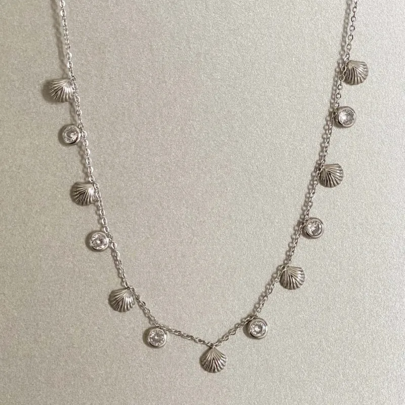 Hanaali  Silver Tone Shell Necklace sold by Luxe Tones