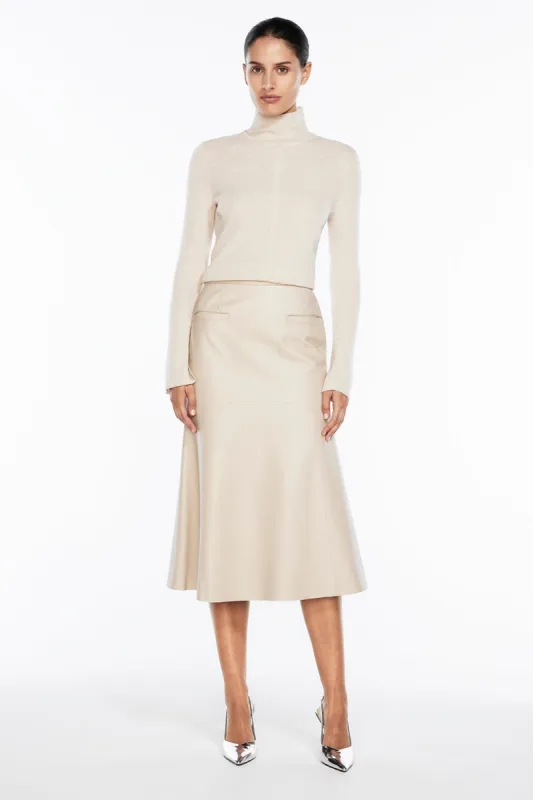 The Fearless Leather Midi Skirt sold by Manning Cartel