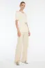 Dramatic Twist Knit Top sold by Manning Cartel