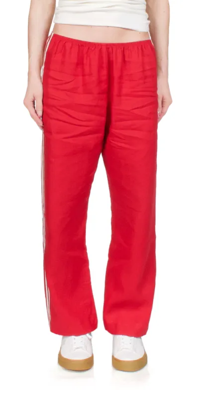 The Linen Crop Stripe Pant Bell Pepper made by DONNI.