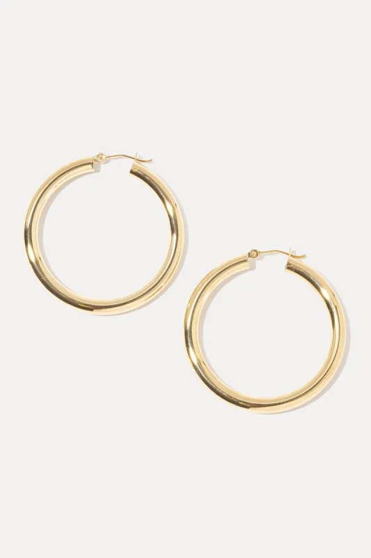Medium Tube Hoops sold by Miranda Frye