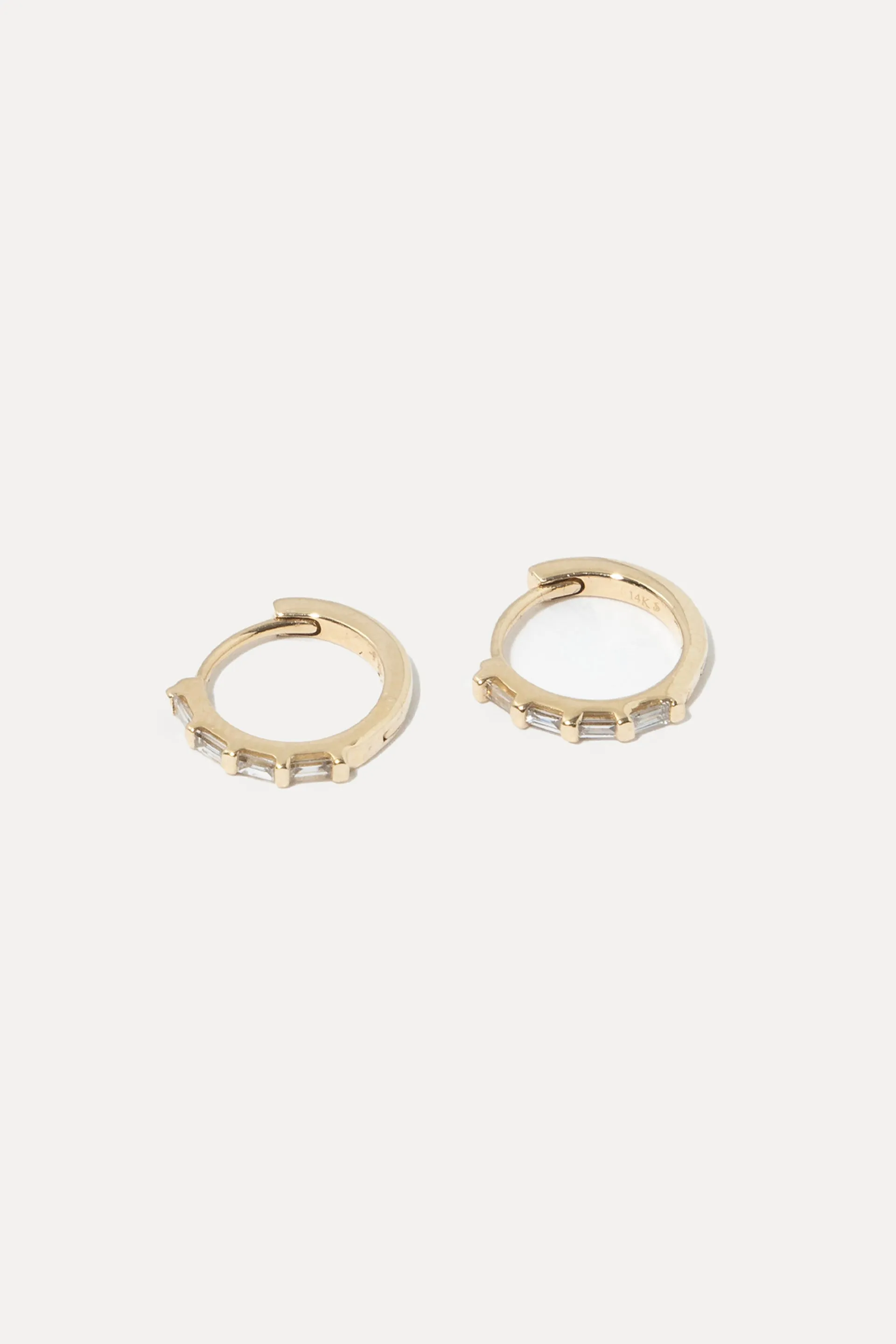 Baguette Diamond Huggies sold by Miranda Frye