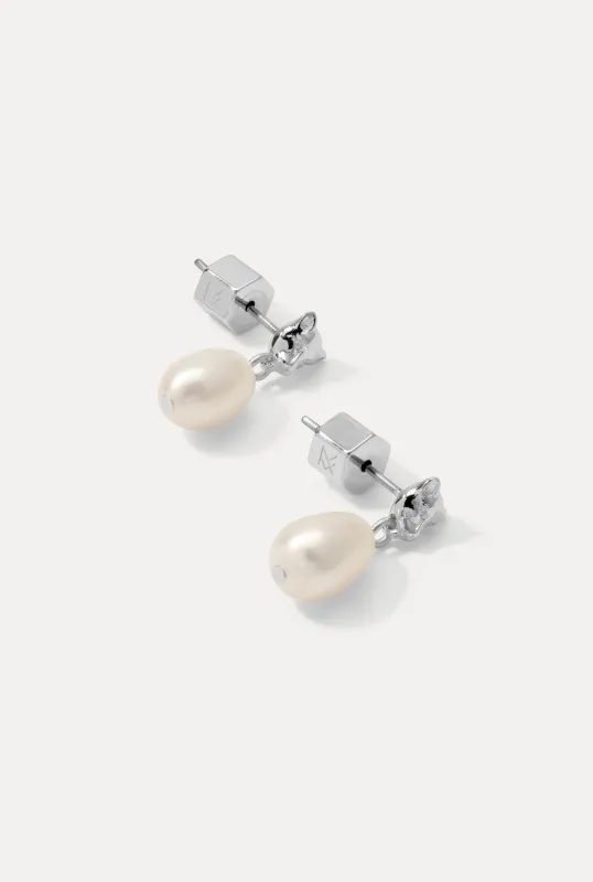 Panther Pearl Earrings made by Miranda Frye