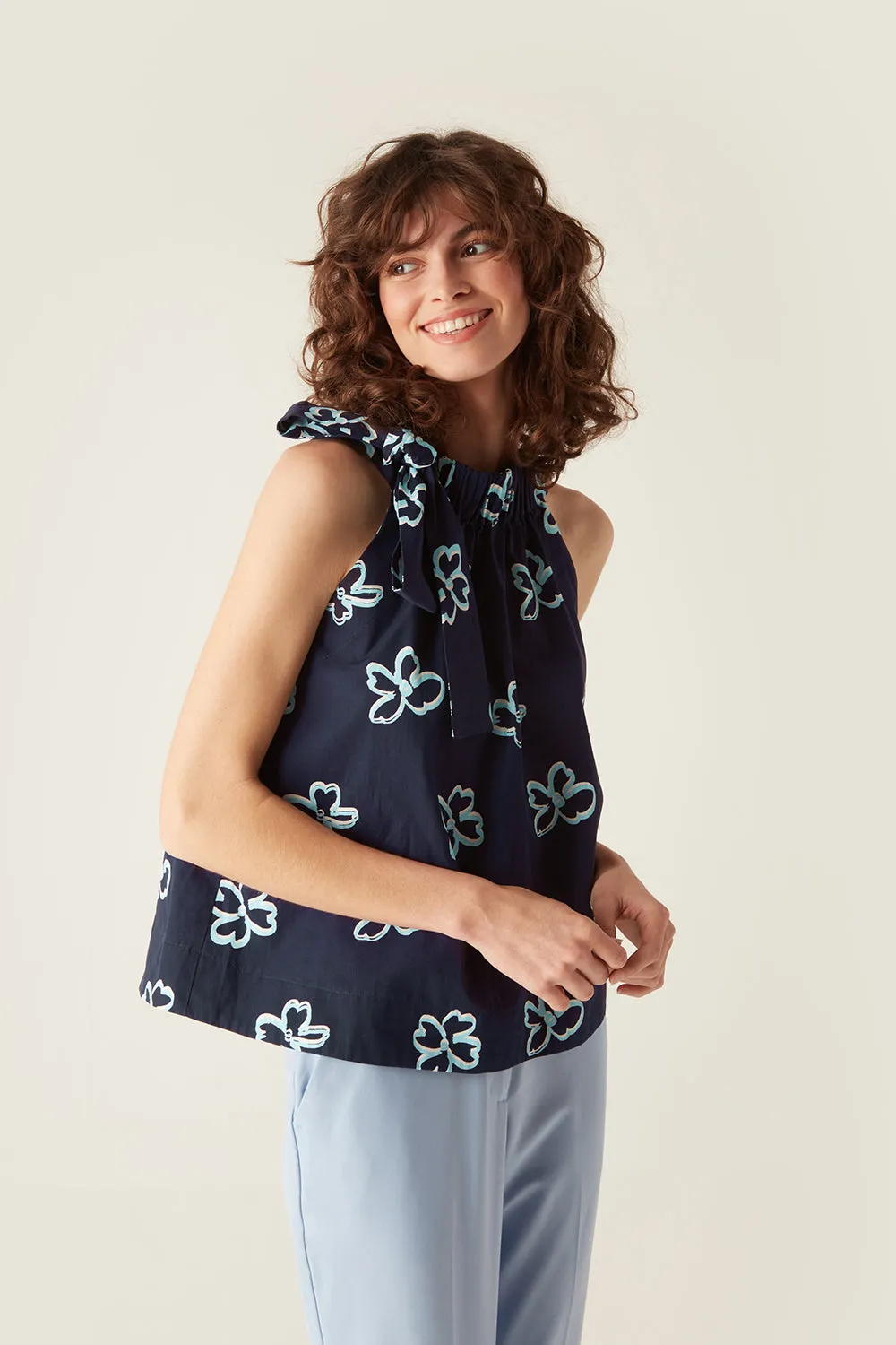 Blaire Top Navy Floral sold by Mirla Beane