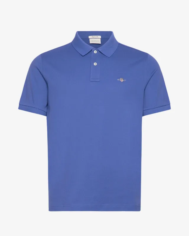 Reg shield pique polo - Blå sold by Modish