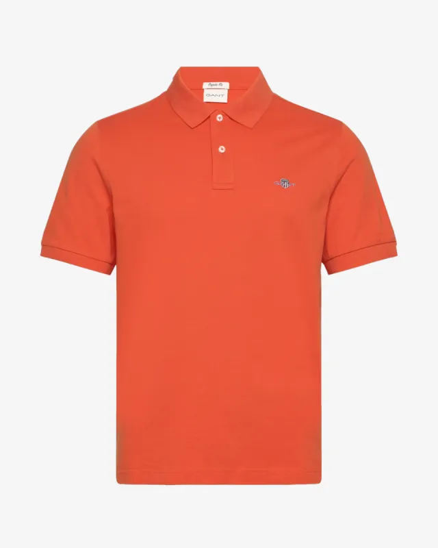 Reg shield pique polo - Orange sold by Modish
