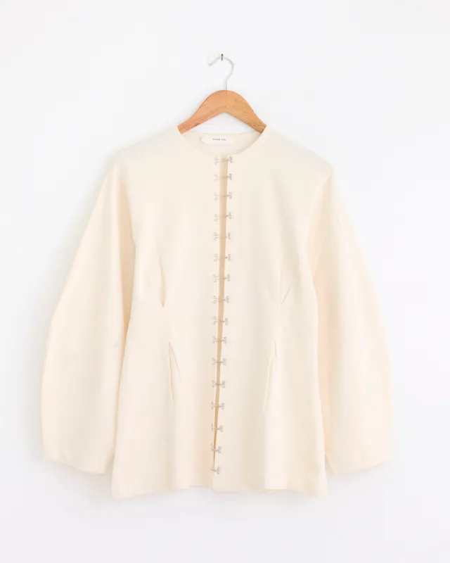 Pinch Waist Cardigan in Ivory made by Chan Luu