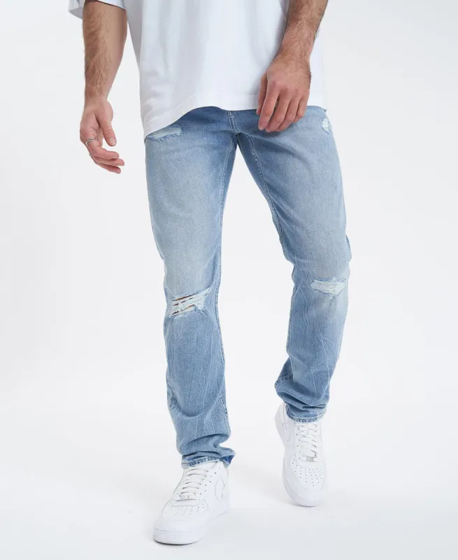Slim Taper Jeans Destroyed Light Blue sold by Neverland