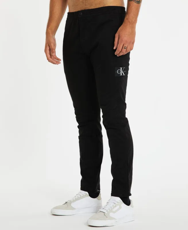 Monologo Badge Casual Chino Black sold by Neverland