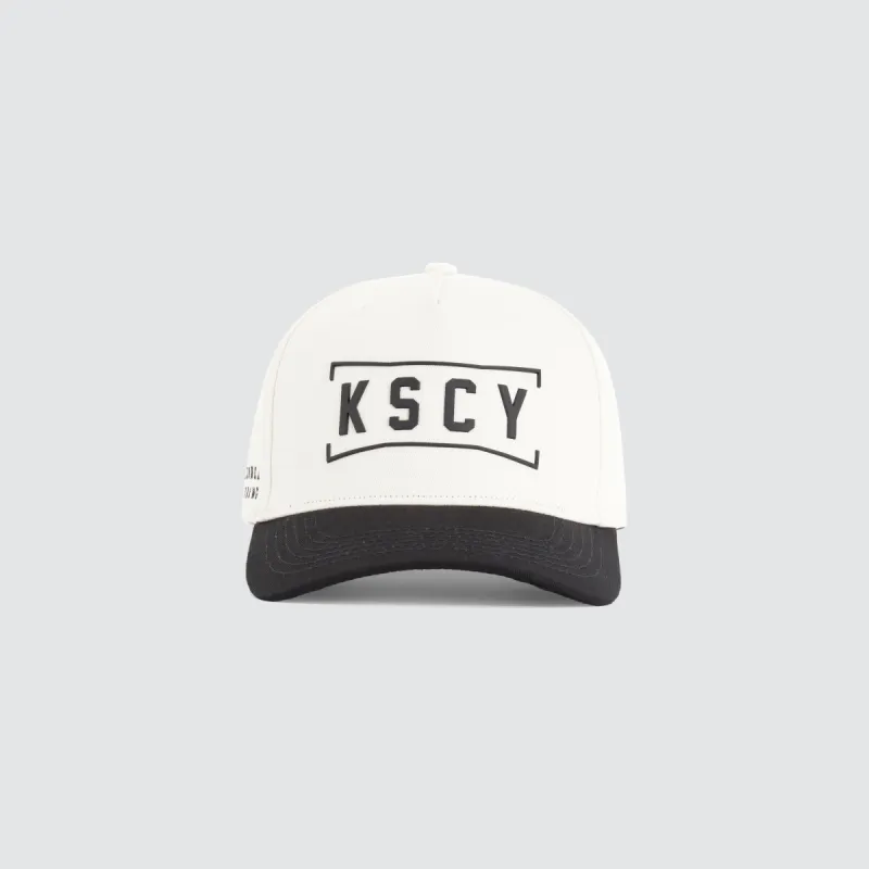 Bronx 5 Panel Curved Peak Cap White/Black sold by Neverland