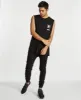 Rockwell Muscle Top Black sold by Neverland
