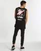 Rockwell Muscle Top Black sold by Neverland