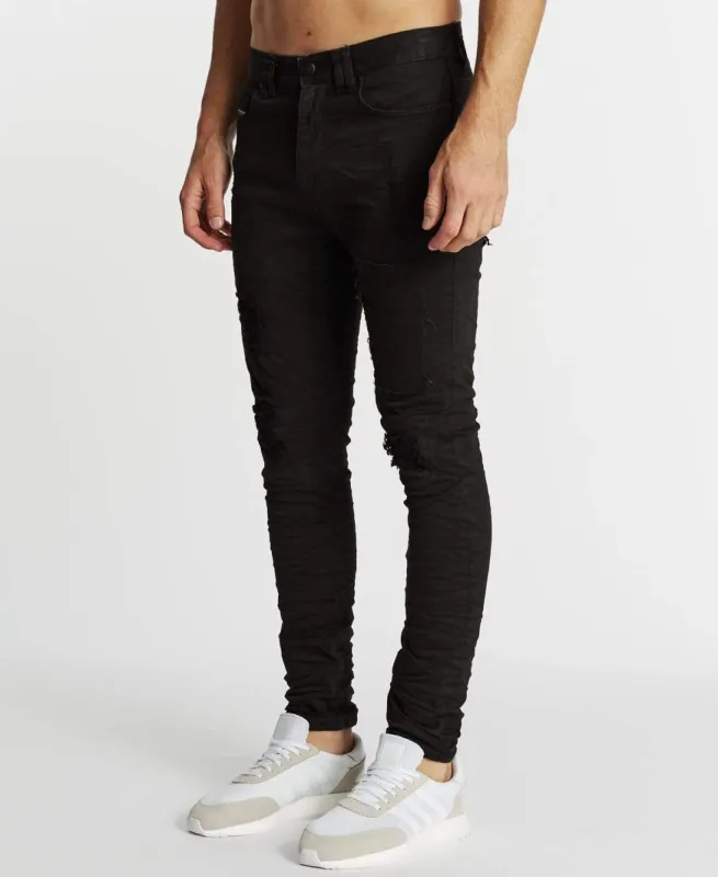 Doomsday Skinny Jeans Destroyed Black sold by Neverland