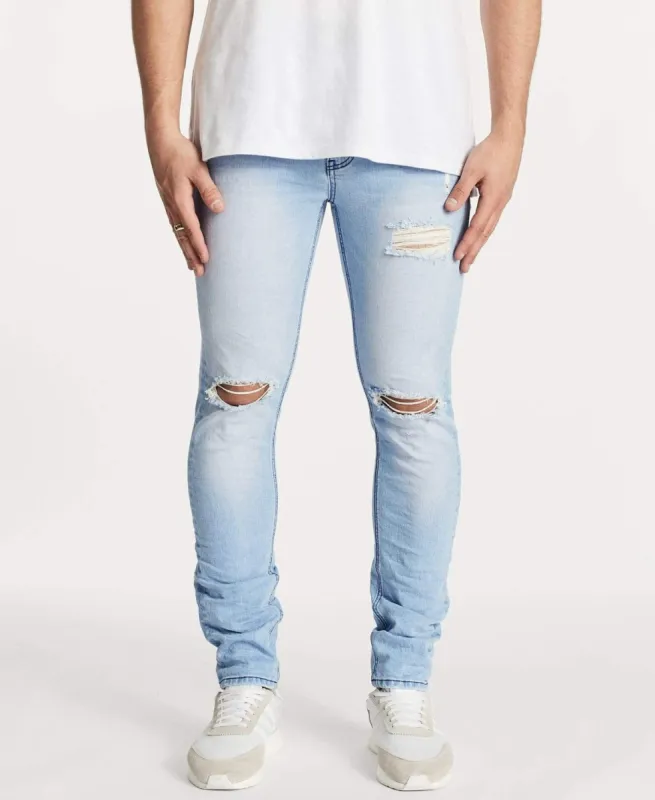 Flynn 5 Pocket Skinny Fit Jean Destroyed Alaskan Blue made by Neverland