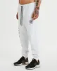 Irvine Track Pants White sold by Neverland