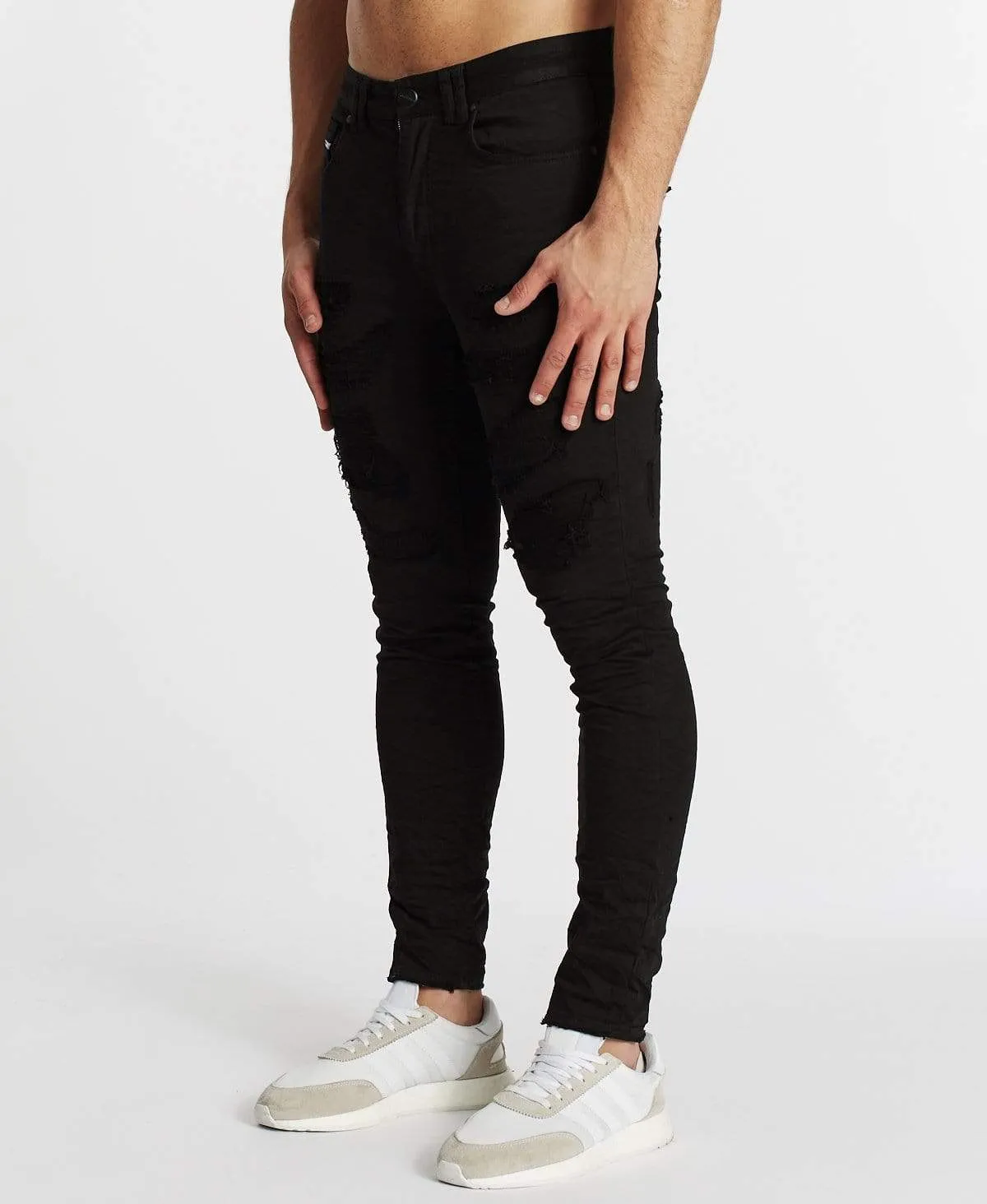 Shredder Skinny Jean Destroyed Black sold by Neverland