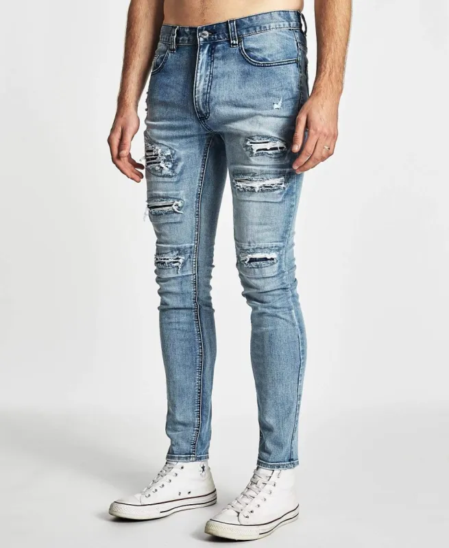 Outlaw Skinny Jean Destroyed Indigo sold by Neverland