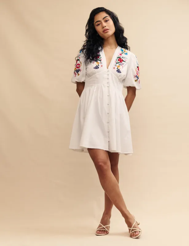 White Embroidered Starlight Mini Dress sold by Nobody's Child