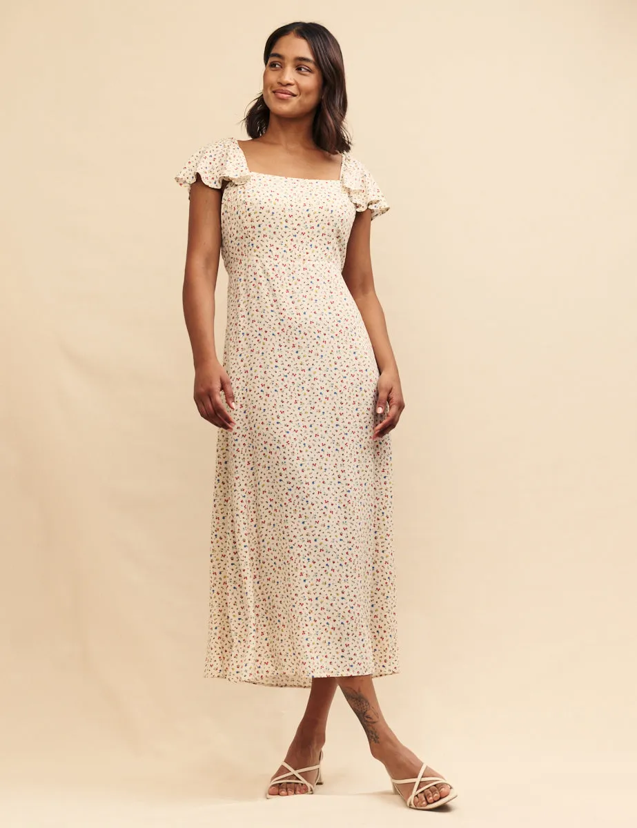 White Ditsy Floral Elsie Midi Dress sold by Nobody's Child
