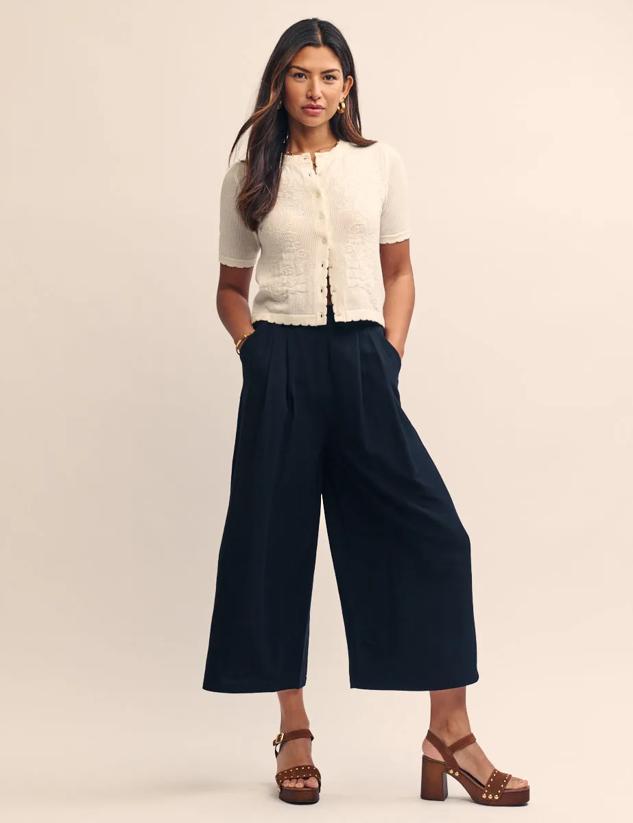 Black Pleated Cropped Wide Leg Zeena Trousers sold by Nobody's Child