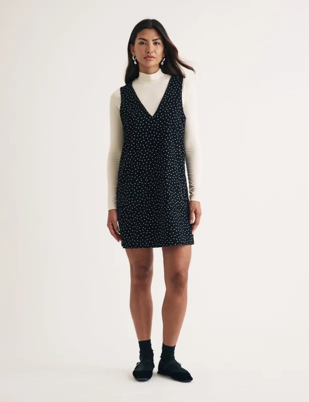 Black Polka Dot Cord Piper Mini Pinafore Dress sold by Nobody's Child