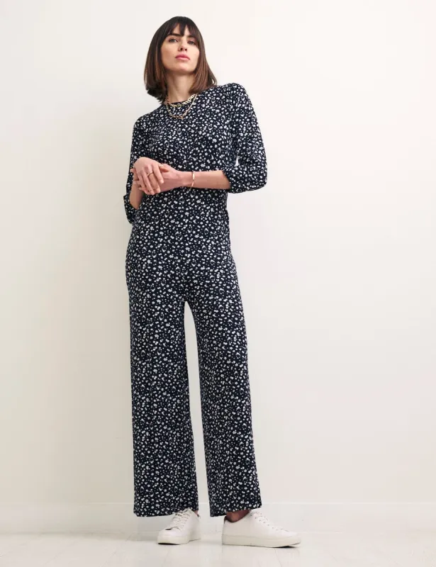 Black Floral Delta Jumpsuit sold by Nobody's Child